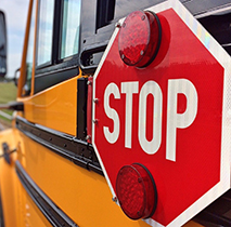 School bus with stop sign on the side
